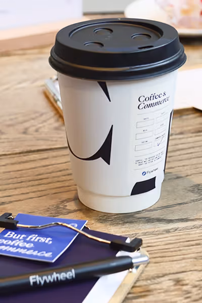 Coffee and Commerce coffee cup